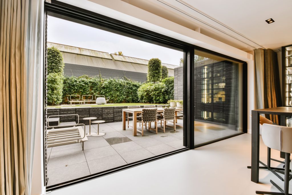 sliding glass doors Attractive huge sliding glass door leading to the courtyard