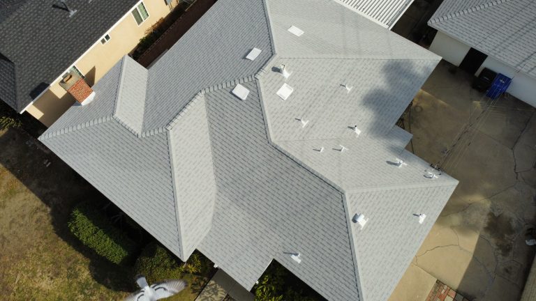 aerial view of light grey roof big house